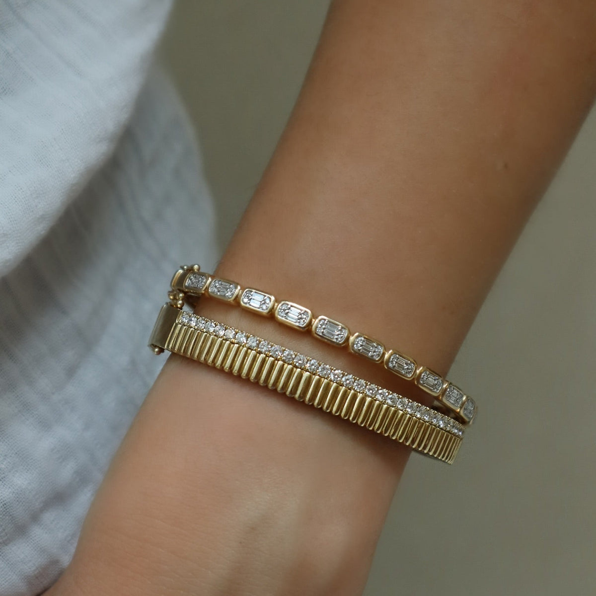 14kt. Yellow gold Diamond Baguette Bangle with 0.65ct Diamond Baguette Bezel set - Alternate View 1